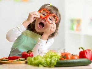 Child eating vegetables